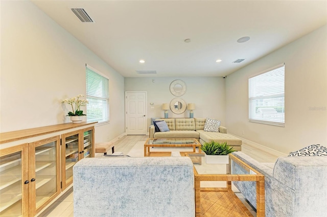 living room with light hardwood / wood-style floors