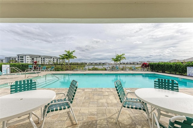 view of pool featuring a patio area