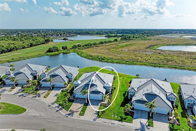 drone / aerial view with a water view