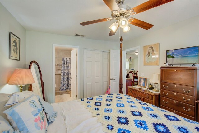 bedroom featuring ensuite bath, ceiling fan, and light wood-type flooring