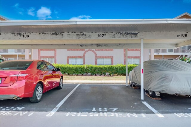 exterior space featuring a carport