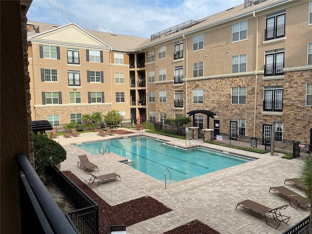 view of pool with a patio area