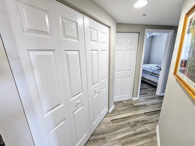 hallway featuring light hardwood / wood-style flooring