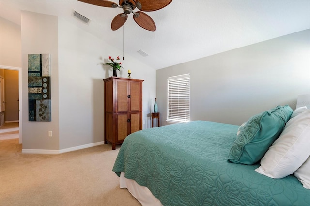 bedroom featuring ceiling fan, light carpet, and vaulted ceiling