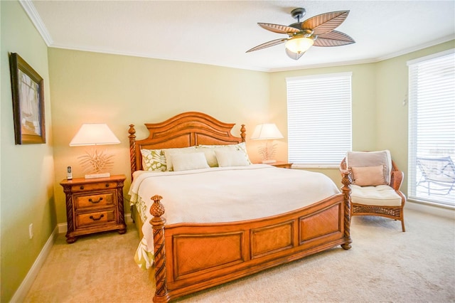 bedroom featuring light carpet, ceiling fan, crown molding, and multiple windows