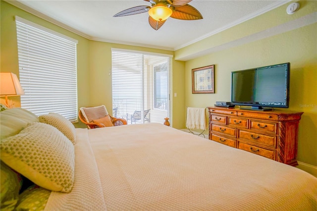 bedroom with ornamental molding, ceiling fan, and access to exterior