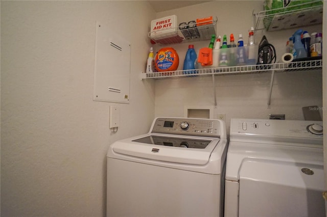 washroom with hookup for a washing machine and separate washer and dryer