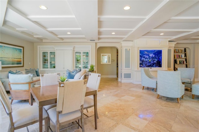 tiled dining space featuring beamed ceiling and coffered ceiling