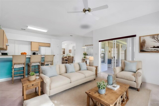 living room featuring ceiling fan