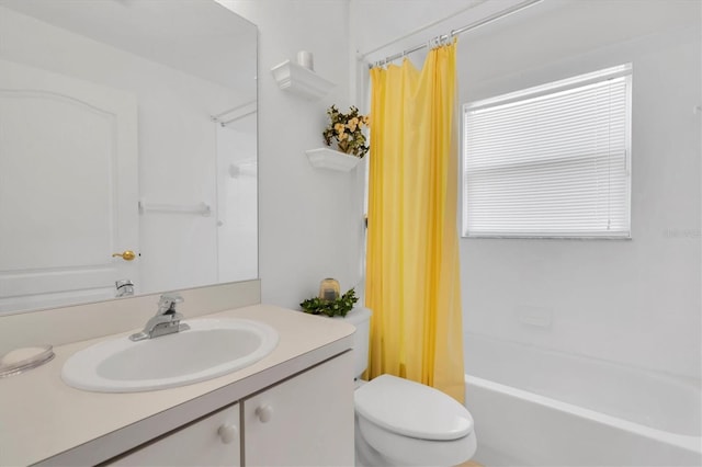 full bathroom featuring vanity, toilet, and shower / bathtub combination with curtain