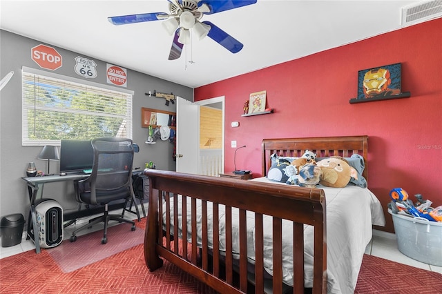 bedroom with ceiling fan and visible vents