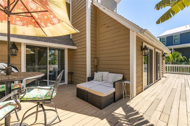 wooden deck featuring an outdoor living space