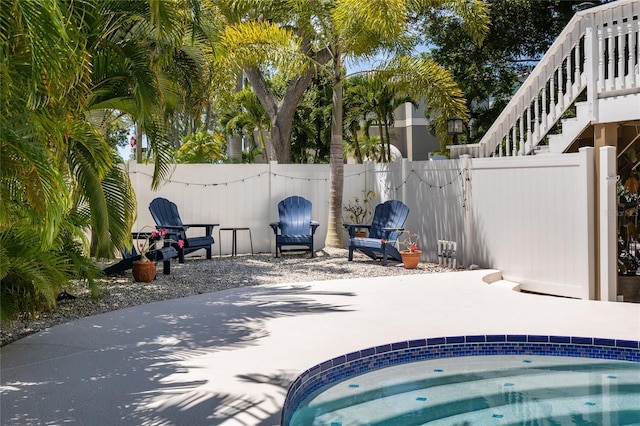 exterior space with fence and a patio