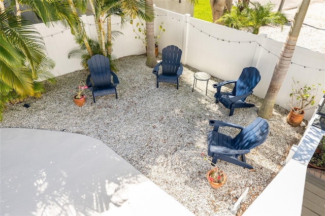 view of yard featuring a fenced backyard and a patio