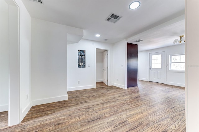 unfurnished room featuring wood-type flooring