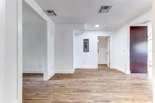 empty room featuring hardwood / wood-style floors