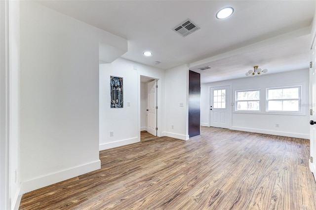 empty room featuring hardwood / wood-style flooring