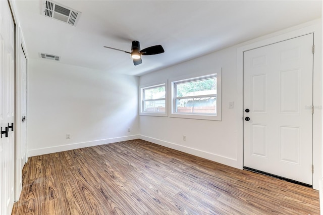 entryway featuring wood-type flooring and ceiling fan