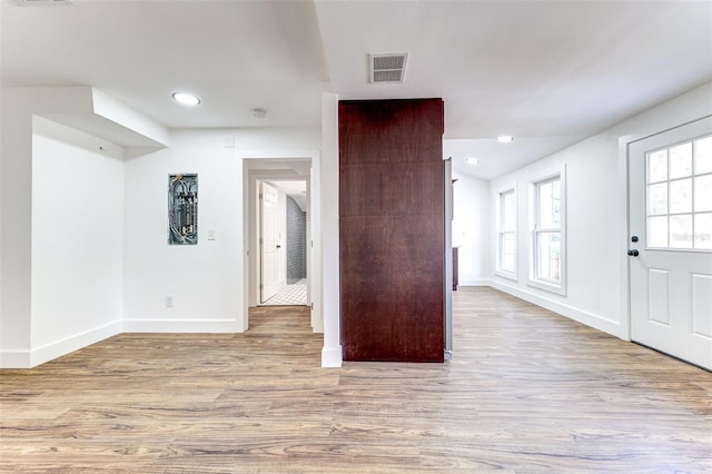 entrance foyer featuring hardwood / wood-style flooring