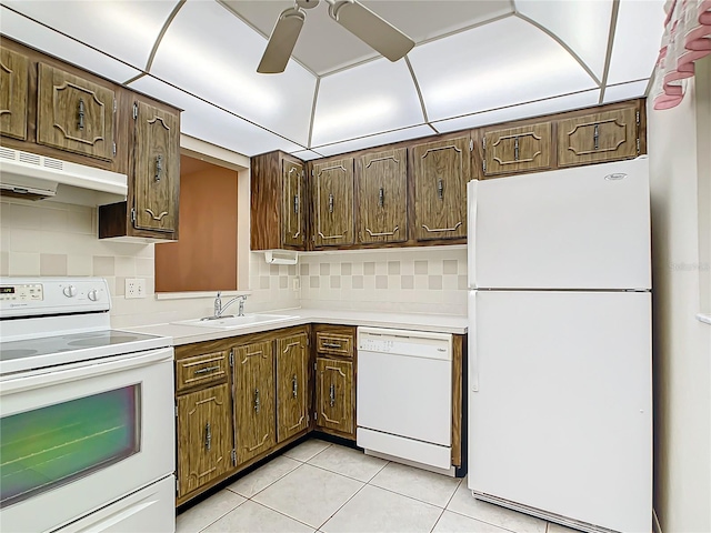 kitchen with white appliances, decorative backsplash, sink, ceiling fan, and light tile patterned flooring