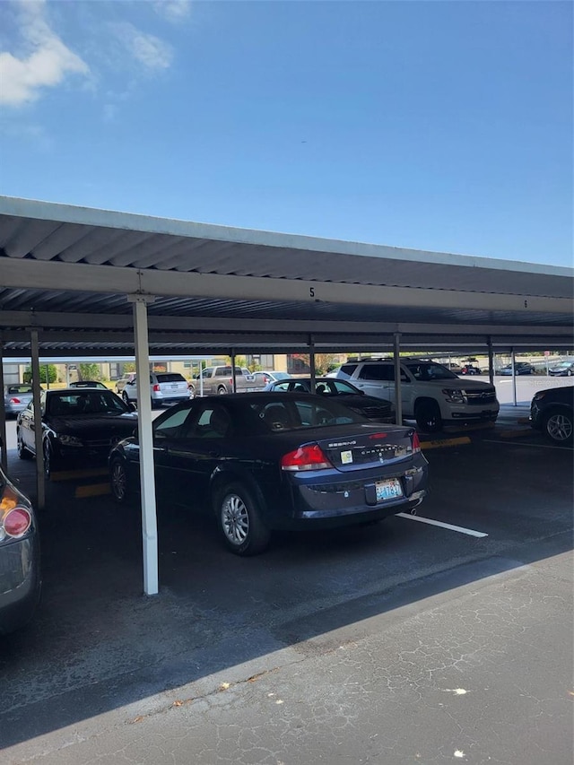 view of parking with a carport