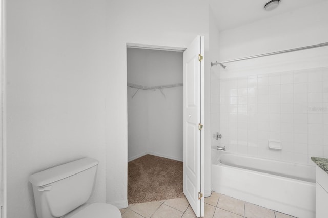 full bathroom featuring tile floors, bathtub / shower combination, toilet, and vanity