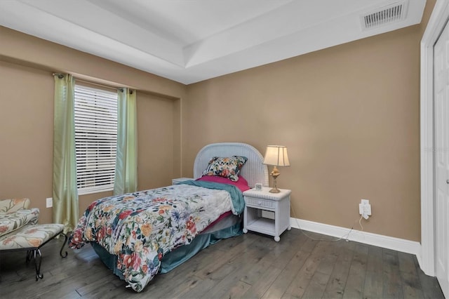 bedroom featuring dark wood-type flooring