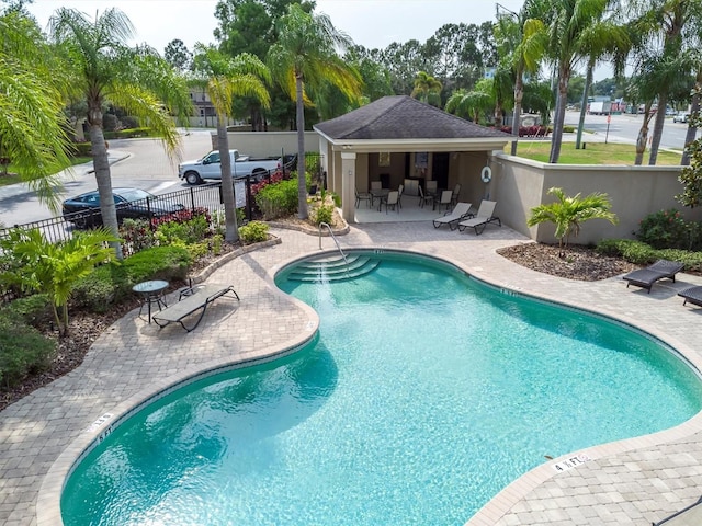 view of swimming pool featuring a patio