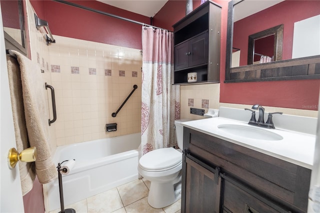 full bathroom featuring tile flooring, shower / bath combination with curtain, large vanity, and toilet