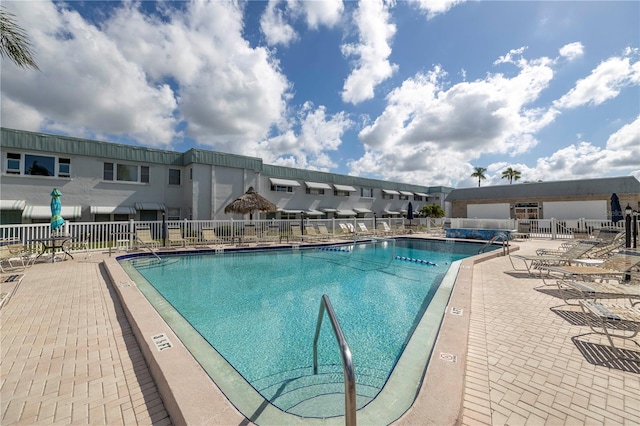 view of pool featuring a patio area