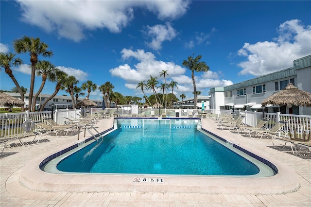 view of swimming pool featuring a patio