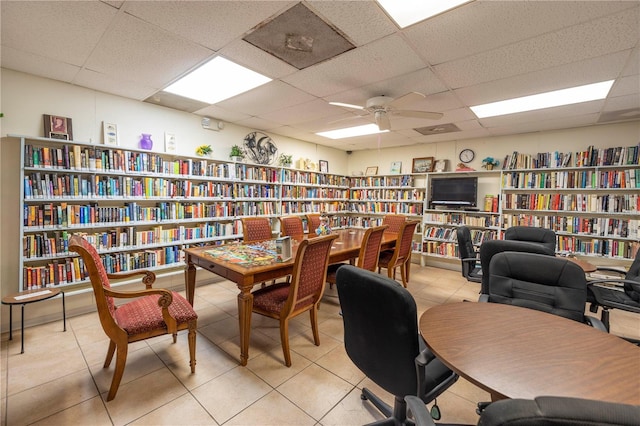 tiled office featuring a drop ceiling