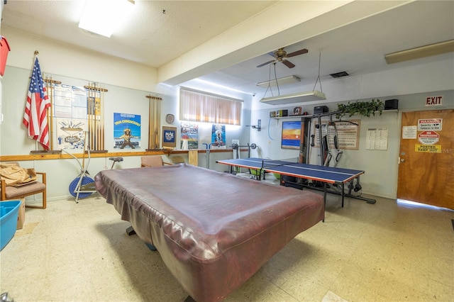 playroom with a textured ceiling, pool table, ceiling fan, and tile floors