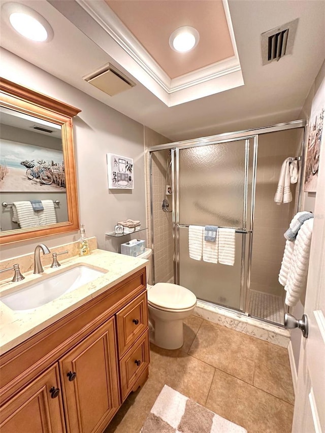 full bathroom featuring a stall shower, visible vents, and vanity