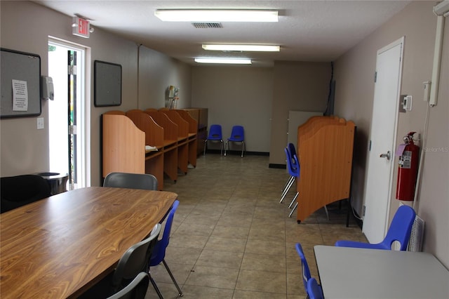 view of tiled dining space