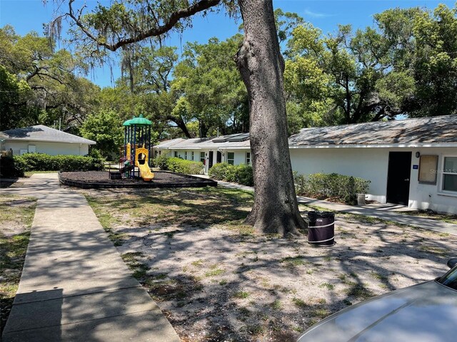 view of yard with a playground