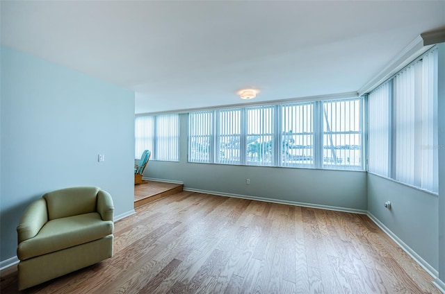 unfurnished room featuring hardwood / wood-style flooring