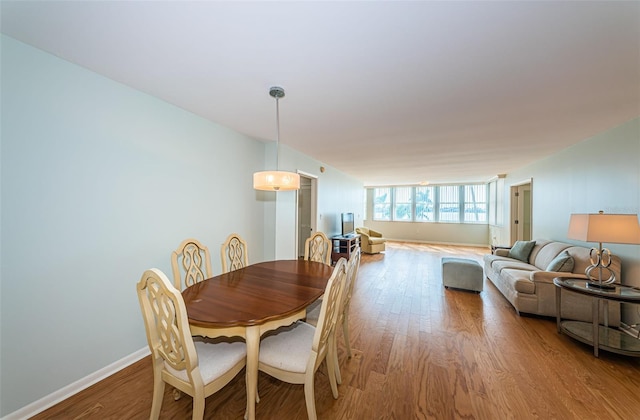 dining room featuring hardwood / wood-style flooring