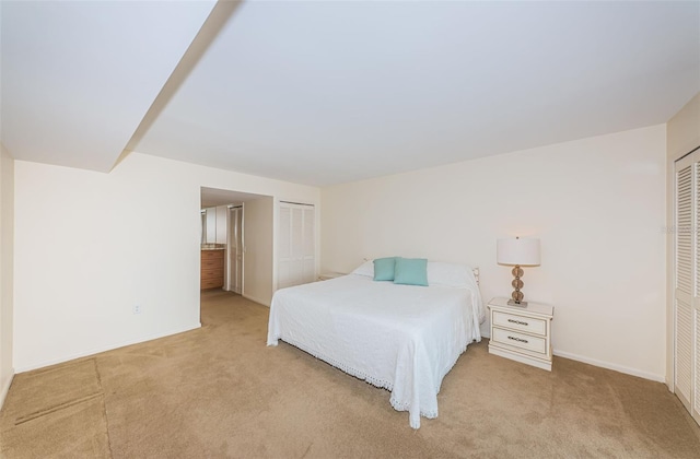 bedroom with light carpet