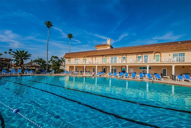 view of swimming pool with a patio area