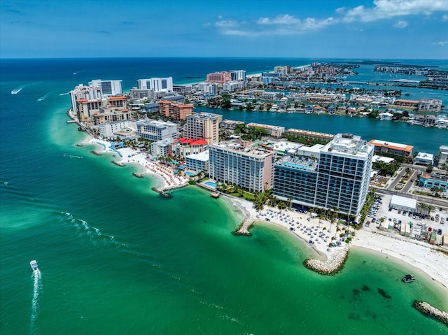 bird's eye view with a view of the beach and a water view