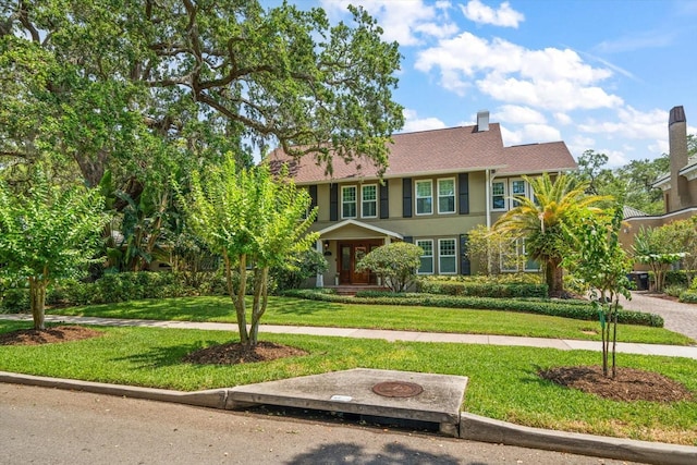 view of front facade with a front lawn