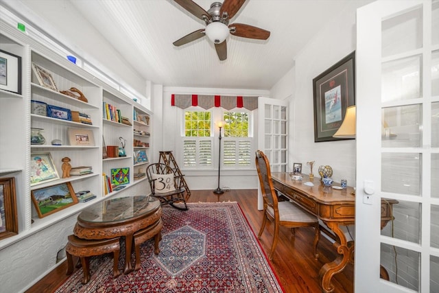 office featuring wood-type flooring and ceiling fan