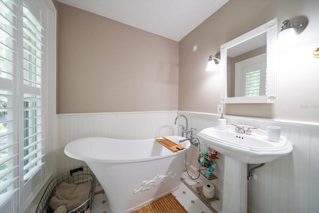 bathroom with tile flooring