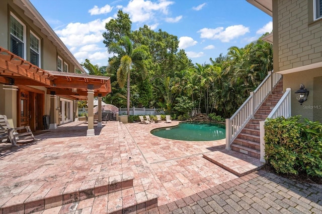 view of pool featuring a pergola and a patio area