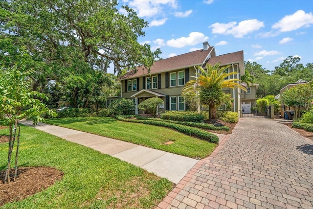 view of front of house with a front lawn