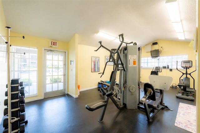 exercise area with lofted ceiling