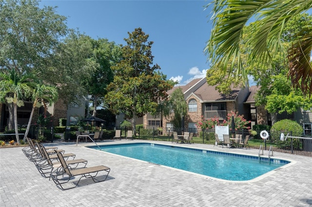 view of pool with a patio area