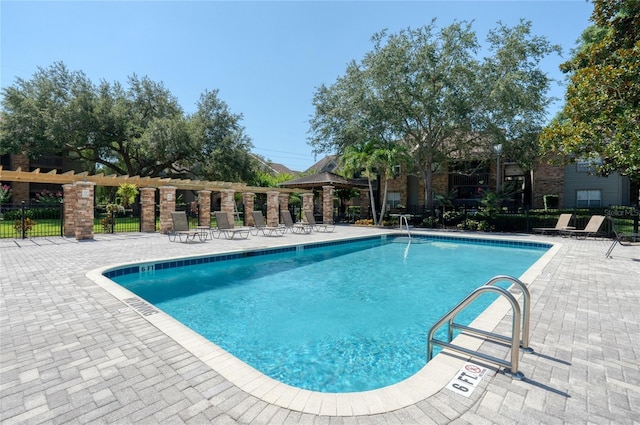 view of swimming pool with a gazebo and a patio area