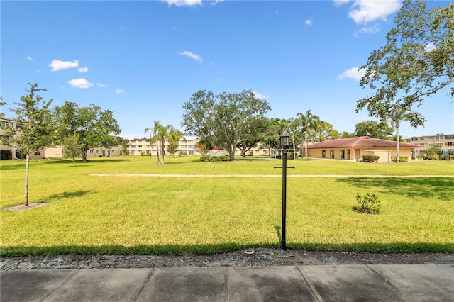 surrounding community with a lawn